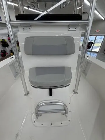 Slide: The Image of Interior view of a Bay Rider 2260 FS boat with gray seating and stainless steel railing. - 8