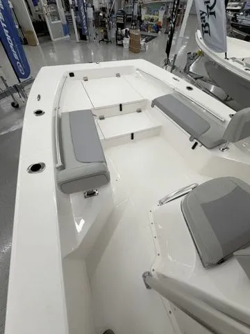 Slide: The Image of The image shows the deck of a Bay Rider 2260 FS boat with gray cushions. - 3