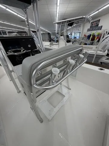 Slide: The Image of The image shows the cockpit of a Bay Rider 2260 FS with rod holders and a gray seat. - 10