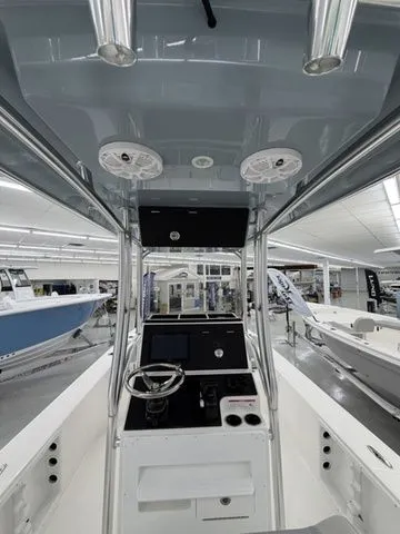 Slide: The Image of Interior view of a Bay Rider 2260 FS boat with helm and electronics. - 11