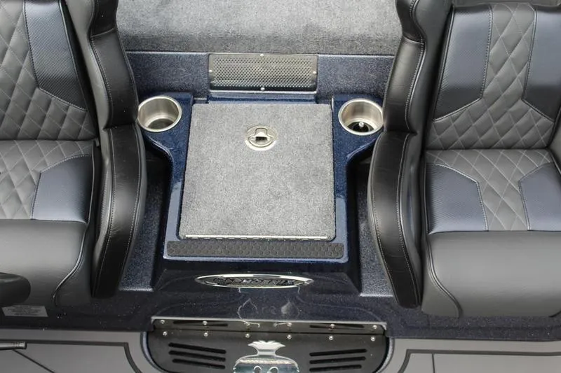 Slide: The Image of Interior of 2027 Phoenix 921 Elite X boat with leather seats and cup holders. - 23
