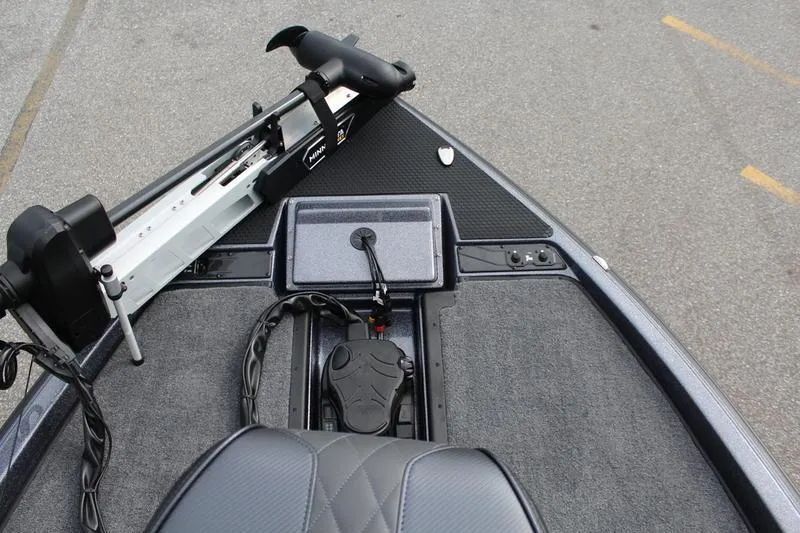 Slide: The Image of Front deck of 2027 Phoenix 921 Elite X boat with trolling motor and foot pedal. - 11