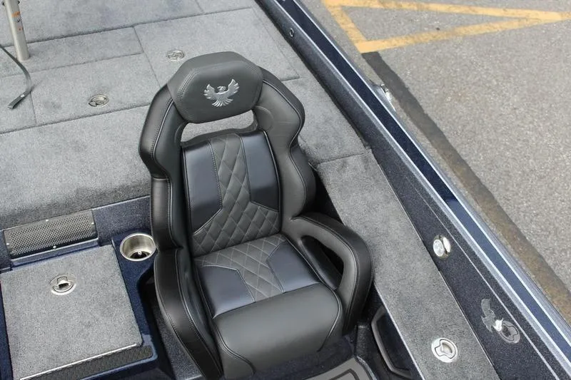 Slide: The Image of Luxurious seating in 2027 Phoenix 921 Elite X boat, featuring sleek black and gray design. - 16
