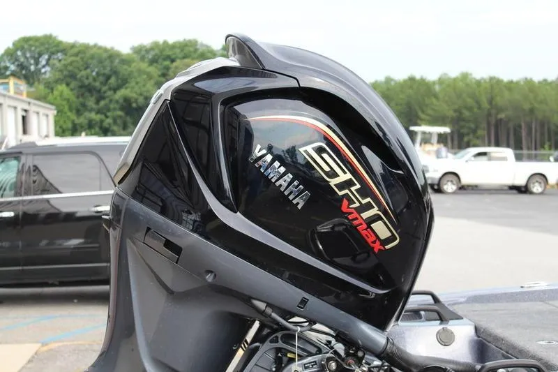 Slide: The Image of Outboard motor on a 2027 Phoenix 921 Elite X boat, featuring Yamaha SHO VMAX branding. - 6
