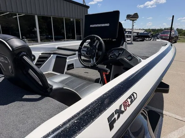 Slide: The Image of The image shows the cockpit of a 2024 Skeeter FXR21 Limited boat with a Humminbird system. - 6
