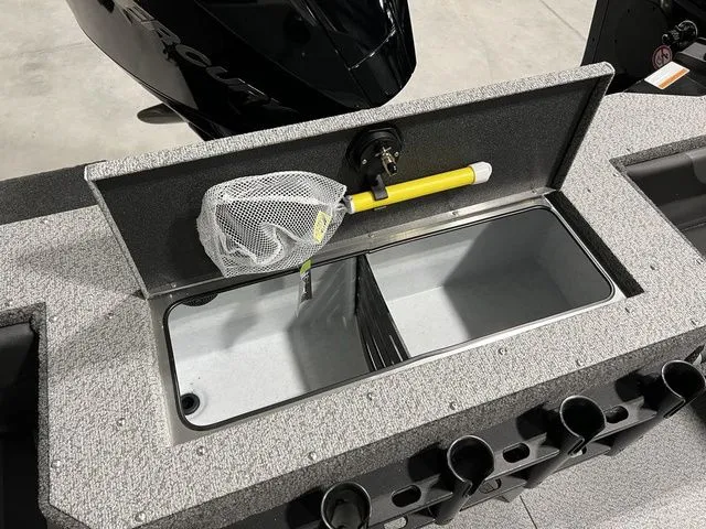 Slide: The Image of Lund 2075 Fisherman 2027: Storage compartment with a net and rod holders. - 24