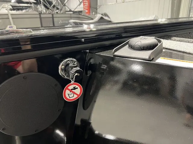 Slide: The Image of Close-up of a black boat deck with speaker and power outlet. - 7
