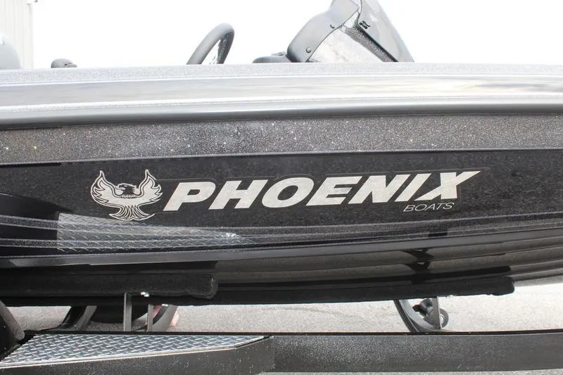 Slide: The Image of 2027 Phoenix 818 Pro boat with sleek black design and logo. - 4