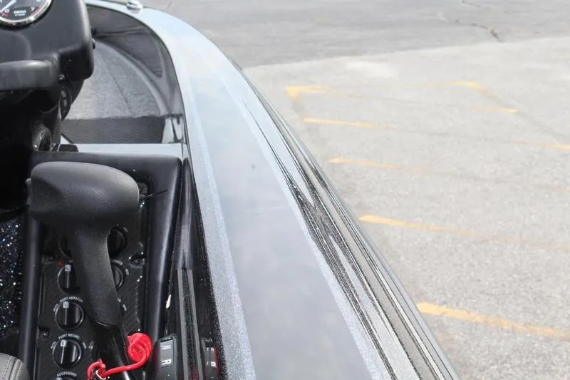 Slide: The Image of Close-up of 2027 Phoenix 818 Pro boat controls and dashboard. - 12