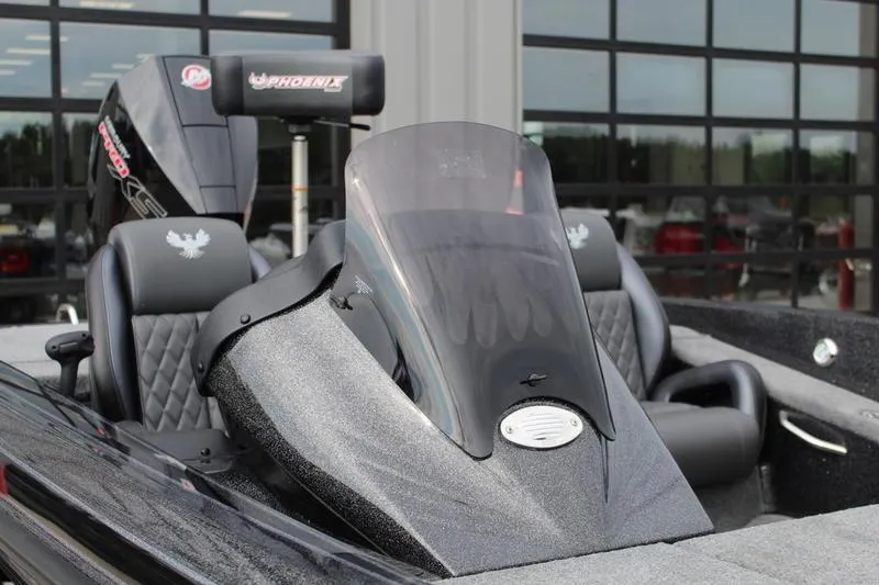 Slide: The Image of 2027 Phoenix 818 Pro boat with sleek design and modern seating. - 13