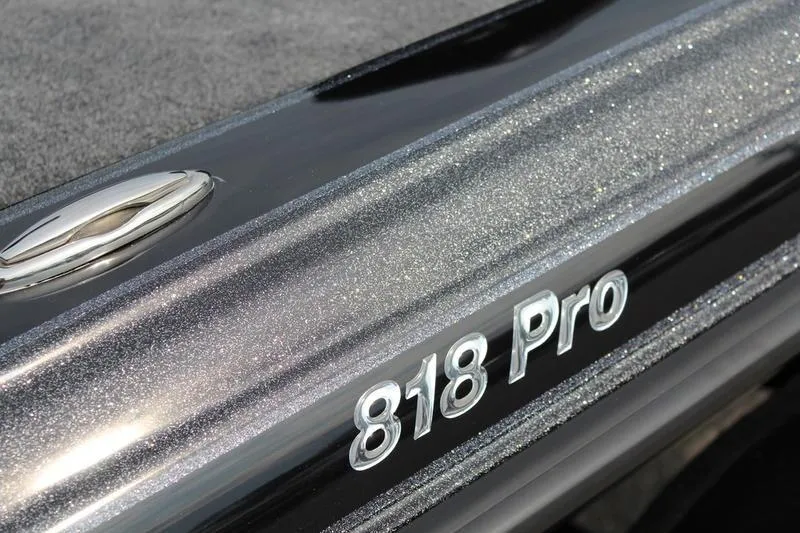 Slide: The Image of Close-up of 2027 Phoenix 818 Pro boat with metallic finish and sleek design. - 3