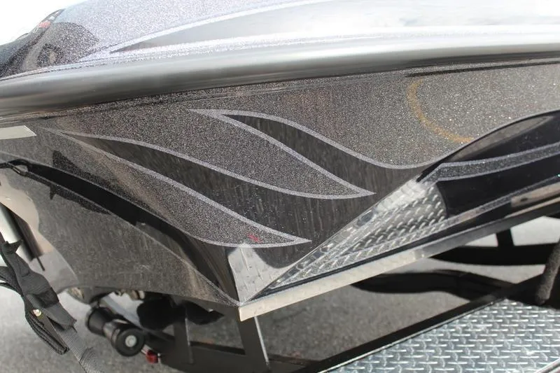 Slide: The Image of Close-up of 2027 Phoenix 818 Pro boat with sleek, metallic design and intricate detailing. - 22