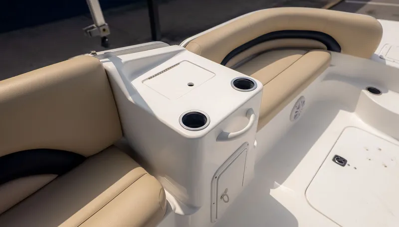 Slide: The Image of Interior view of a 2015 Hurricane FD 198 boat with beige seating. - 8