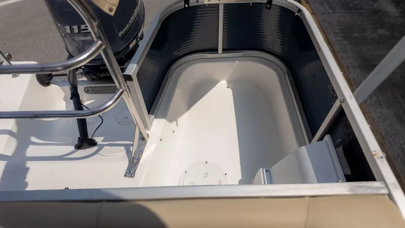 Slide: The Image of Interior view of a 2015 Hurricane FD 198 boat with a Yamaha engine. - 3