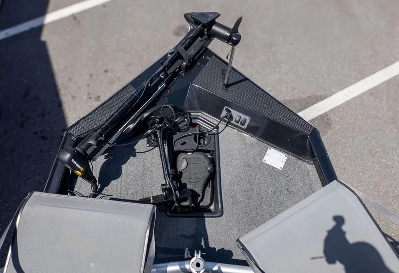Slide: The Image of The image shows the bow deck of a Ranger RT178 boat with fishing equipment. - 14