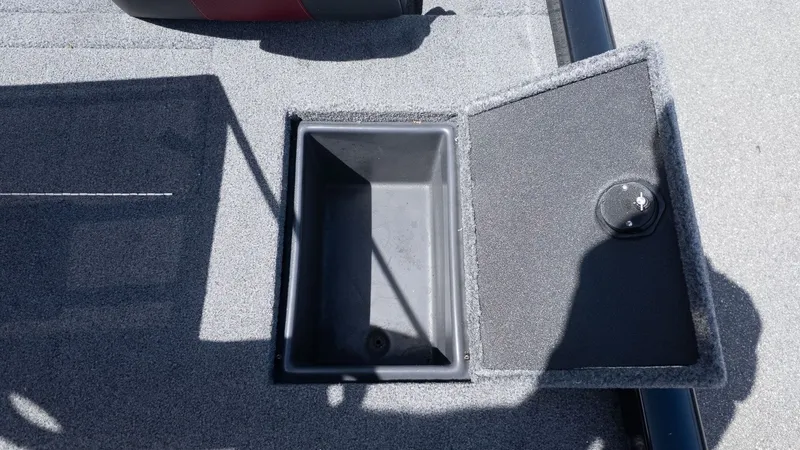 Slide: The Image of An open storage compartment on a 2023 Ranger RT178 boat. - 5