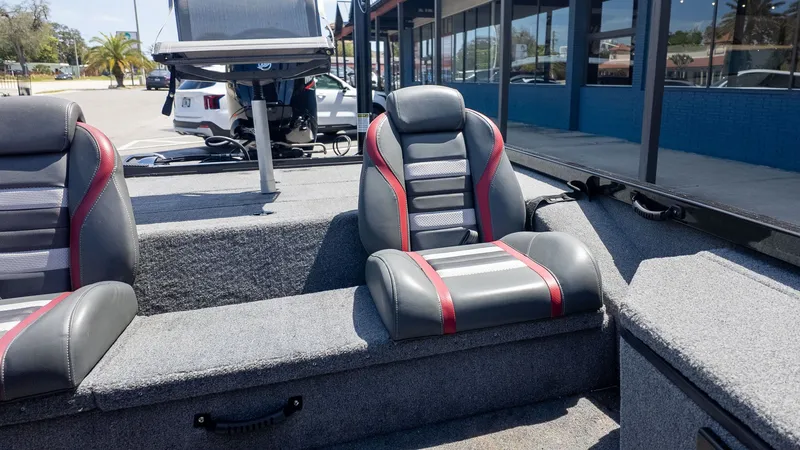 Slide: The Image of The image shows the interior of a Ranger RT178 boat with cushioned seats. - 7