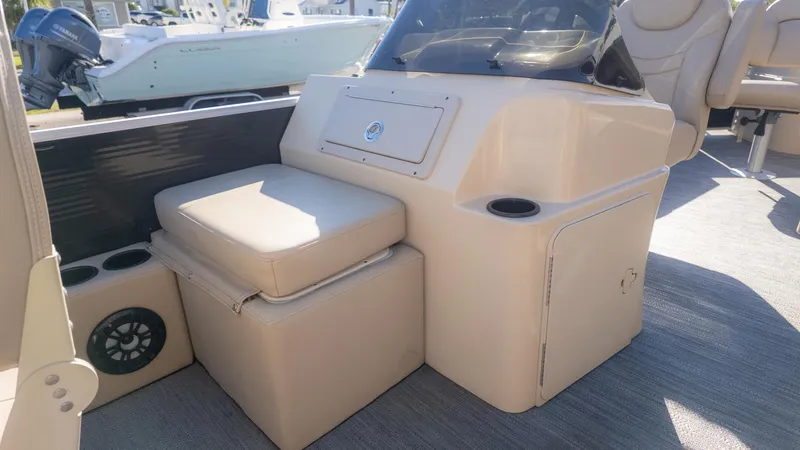 Slide: The Image of Interior of a 2022 Godfrey Sweetwater 2086 F with seating and helm console. - 20