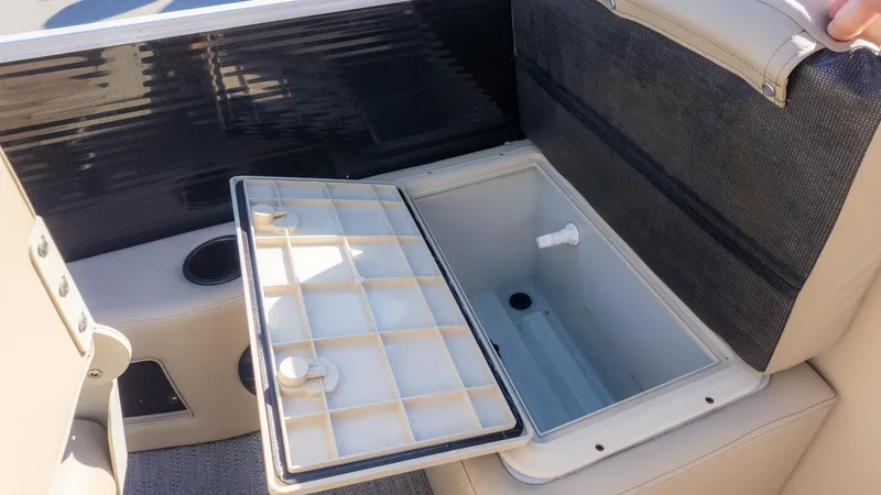 Slide: The Image of Interior view of a boat with an open storage compartment. - 20
