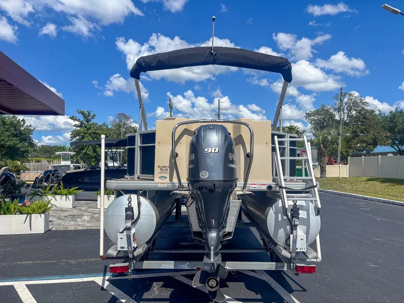 Slide: The Image of A 2022 Godfrey Sweetwater 2086 F pontoon boat with a 90 HP outboard motor. - 3