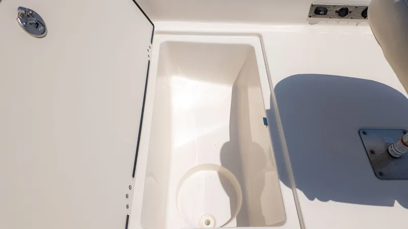 Slide: The Image of Close-up of a white storage compartment on a boat. - 16