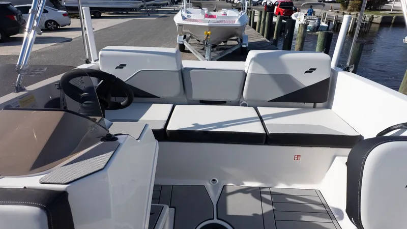 Slide: The Image of The image shows the cockpit of a 2027 Starcraft J7 JET Standard boat. - 6