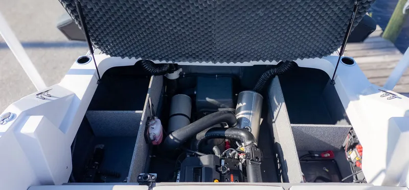 Slide: The Image of Engine compartment of a 2027 Starcraft J7 JET Standard with open hatch. - 7