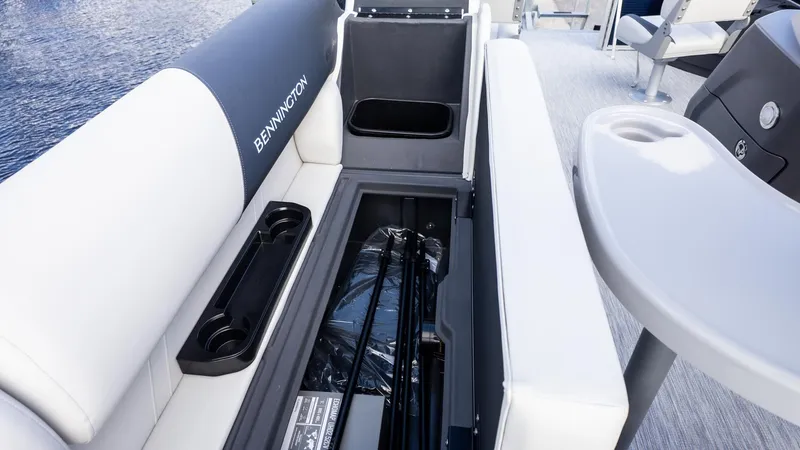 Slide: The Image of Interior view of a Bennington 20 S Fishing boat with storage and seating. - 11