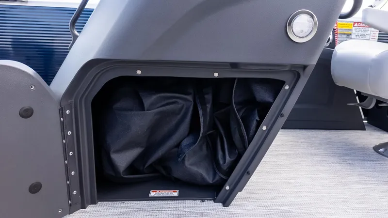 Slide: The Image of Storage compartment under the helm of a Bennington 20 S Fishing boat. - 18
