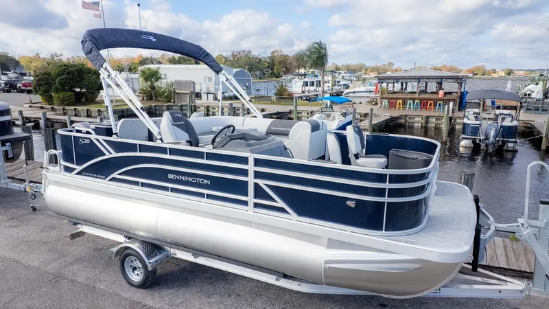 The Image of Bennington 20 S Fishing 2026 on a trailer at the dock. - 1