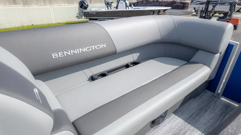 Slide: The Image of The image shows a gray seating area on a Bennington boat, model 20SSRSE, year 2025. - 11