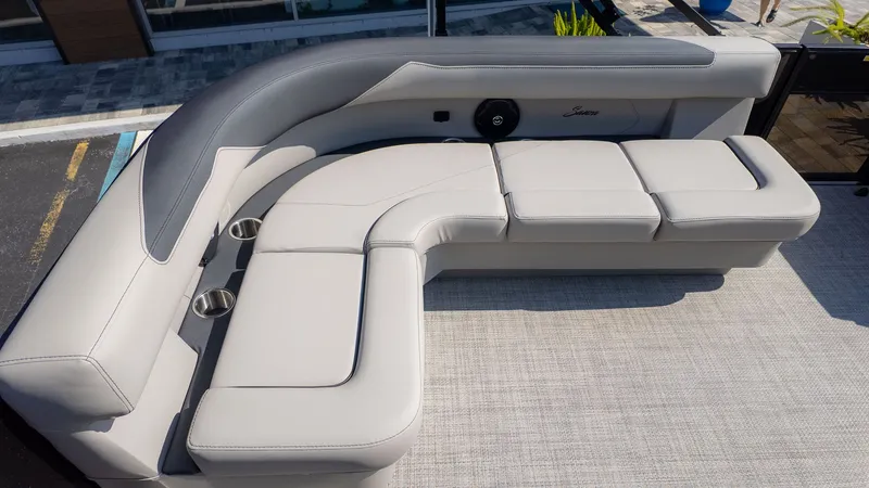 Slide: The Image of 2026 Barletta Sanza 20L with sleek gray upholstery and cup holders. - 6