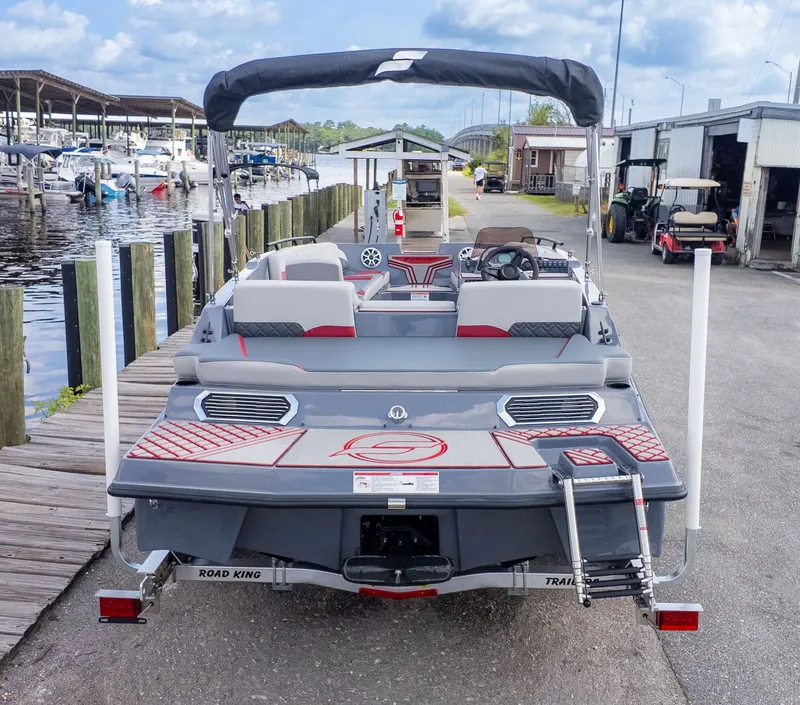 The Image of Starcraft J7 JET SUPER SPORT 2027 at dock with gray and red design. - 1