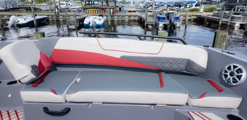 Slide: The Image of Starcraft J7 JET SUPER SPORT 2027 with stylish seating at the dock. - 6