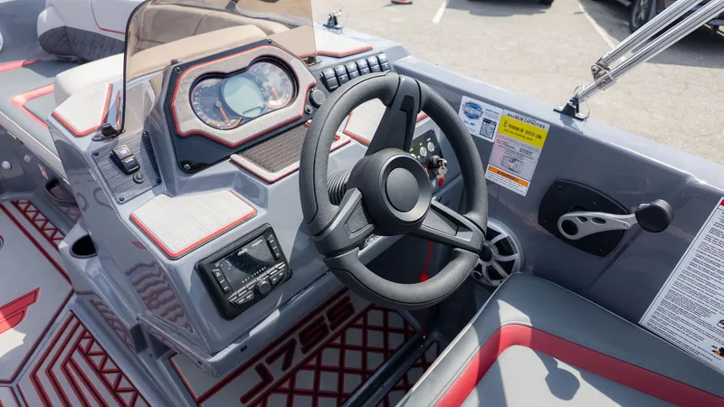 Slide: The Image of 2027 Starcraft J7 Jet Super Sport: Modern cockpit with steering wheel and instruments. - 11