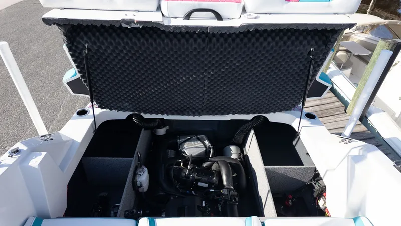 Slide: The Image of Engine compartment of a 2027 Starcraft J7 Jet Super Sport boat. - 3