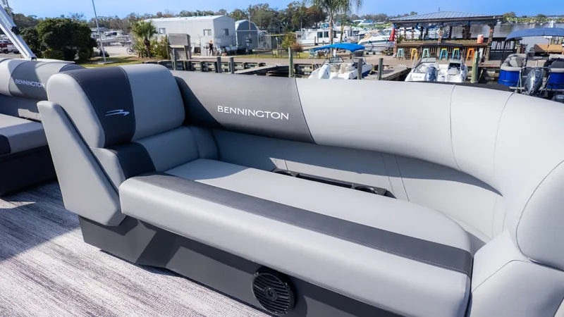 Slide: The Image of Bennington 21 S Fish and Cruise 2026: Sleek gray upholstery on a spacious deck. - 10