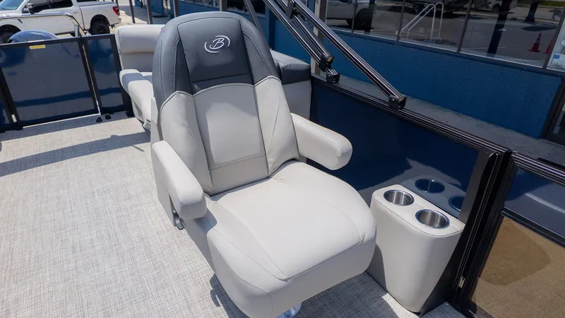 Slide: The Image of Luxurious seating on a Barletta SANZA 22QC boat, featuring cup holders and modern design. - 15