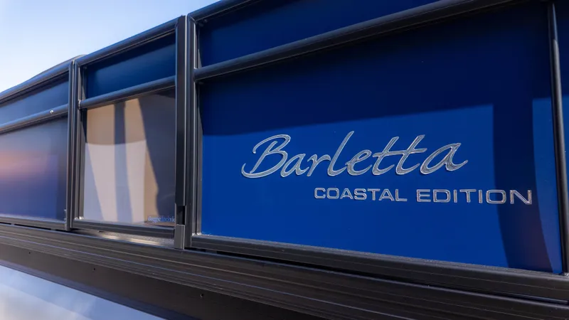 The Image of Close-up of the Barletta Sanza S22QC with blue 'Coastal Edition' lettering. - 1