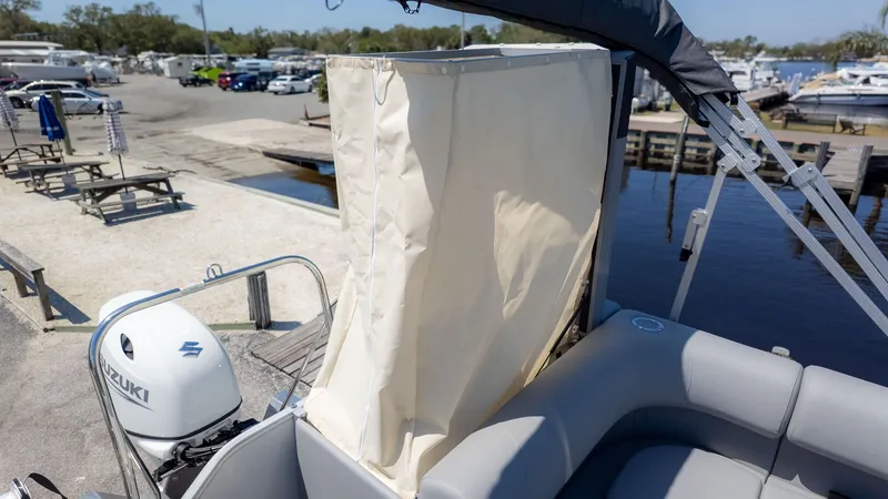 Slide: The Image of Bennington 20 S Cruise 2026 with Suzuki engine at the dock. - 5