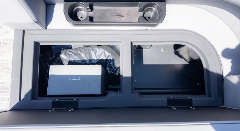 Slide: The Image of Storage compartment on a Bennington 20 S Cruise boat with a Garmin device. - 9