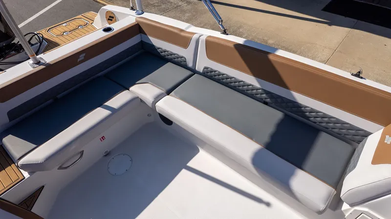 Slide: The Image of Seating area of the 2026 Starcraft SVX 211 OB with gray and brown upholstery. - 8