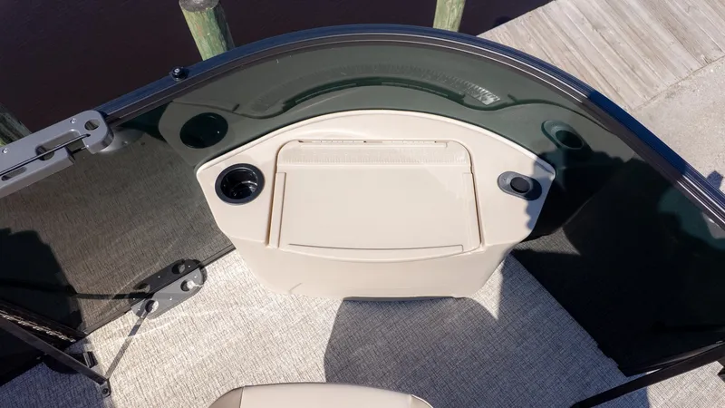 Slide: The Image of The image shows the cockpit of a 2026 Bennington 21 S Fishing boat with a helm station. - 15