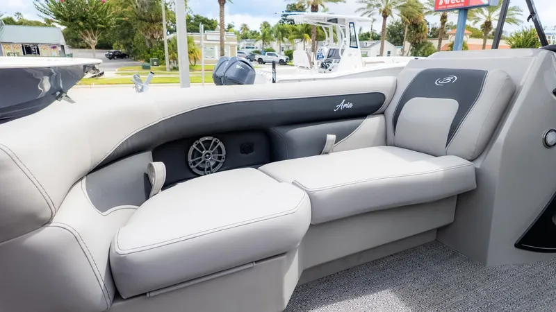 Slide: The Image of Interior of a 2026 Barletta ARIA 22QC with gray upholstered seating. - 16