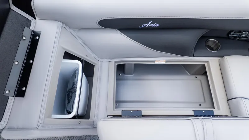 Slide: The Image of Interior of a Barletta ARIA 22QC with storage compartment and speaker. - 12