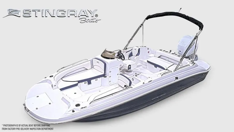 The Image of Stingray 192 SC from 2027 with open deck, seating, and a Bimini top. - 1