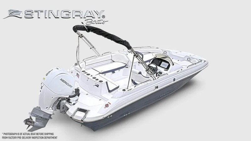 Slide: The Image of A white Stingray 192 SC boat with a Mercury outboard motor. - 4