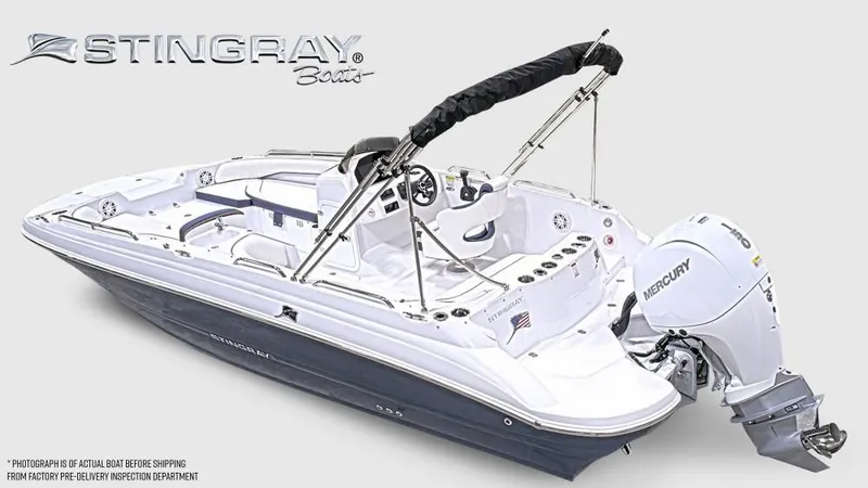 Slide: The Image of 2027 Stingray 192 SC with Mercury outboard motor, white and blue design, sleek layout. - 8