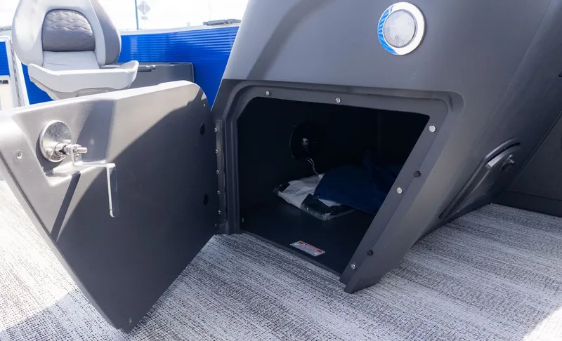 Slide: The Image of Open storage compartment on a Bennington 22 S 4 PT Fishing boat. - 16