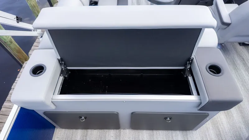Slide: The Image of Bench seat with storage and cup holders on a boat. - 8